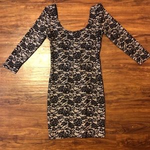 Beige Dress With Black Floral Accents